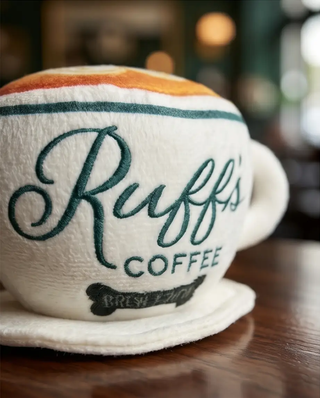 Ruff's Coffee Cup plush squeaker dog toy, white coffee cup design with teal script.