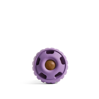 The Pupsicle Lavender dog toy, purple rubber wheel with central brown treat ball