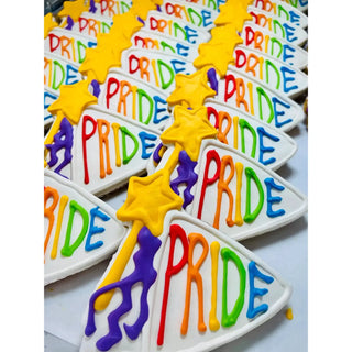 Pride Banner cookies with rainbow PRIDE lettering and yellow star toppers