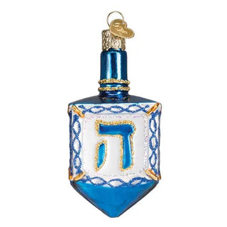 Dreidel ornament in blue and white with gold accents and a Hebrew letter on the front, hanging glass decor