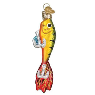 Fishing lure ornament, multicolor glass fish with glitter accents, yellow/orange body, green back, red tail.