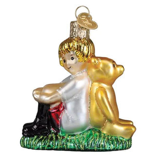 Winnie and Christopher Robin ornament, glass figure with a gold bear and green base.