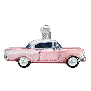 Classic car ornament in pink with a silver roof and chrome accents for holiday decor