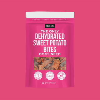 The Only Dehydrated Sweet Potato Bites for Dogs in a bright pink bag showing bite pieces and packaging.