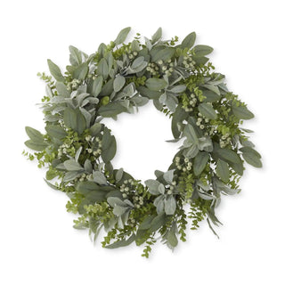 Mixed green foliage wreath with dusty-green leaves and small white berries.