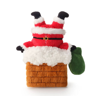 Here Comes Santa interactive snuffle dog toy in red plush Santa suit with white fur trim and black belt.