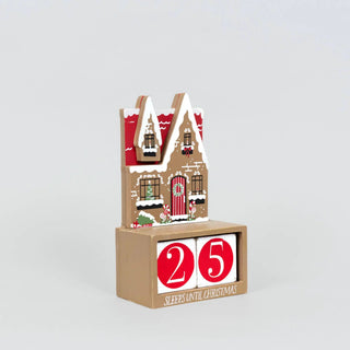 Wood countdown house Christmas decor, 5x8 in, brown with red panels, white snow accents and numbered blocks.