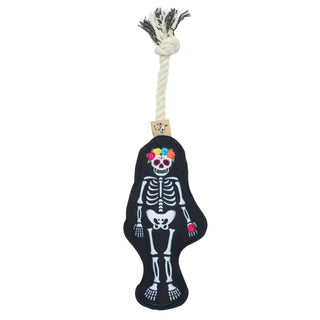 Rope dog toy featuring Day of the Dead skeleton design, black body with colorful flower crown