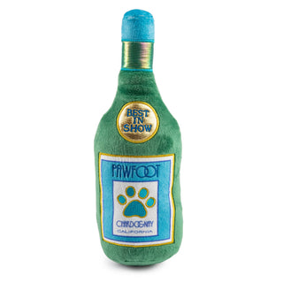 Pawfoot Wine Squeaker dog toy, green plush bottle with blue label and paw print, Best in Show patch