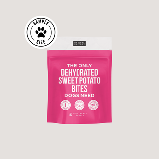 The Only Dehydrated Sweet Potato Bites Dogs Need in a pink sample-size bag