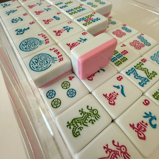 Rose Dragon American Mahjong Tile Set, white tiles with pink edges and blue, red, green markings, 166 tiles.