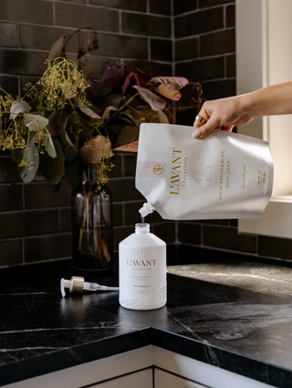 Dish soap refill pouch and white bottle, Blushed Bergamot scent, two items being poured