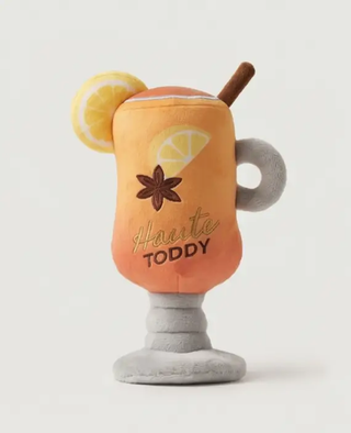 Haute Toddy holiday squeaker dog toy in orange cocktail design with lemon slice and star anise.