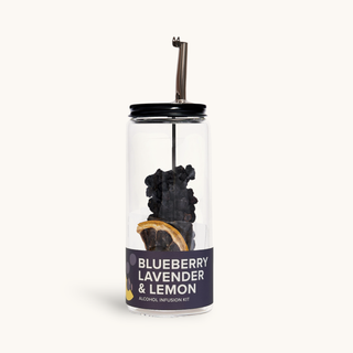 Blueberry Lavender & Lemon Cocktail Infusion Kit in a clear glass bottle with a black lid and metal straw