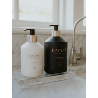 Lucite tray - medium with two pump bottles, white and black, on a marble countertop