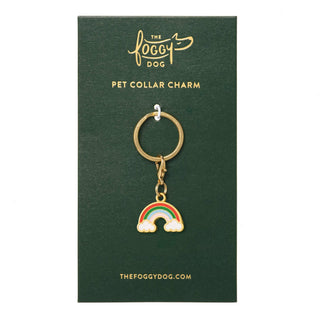 Rainbow collar charm with gold ring and cloud-topped rainbow pendant on a green display card