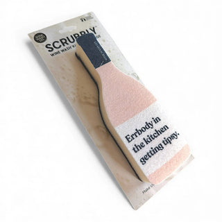 Scrubbly sponge on a display card; pink sponge with dark blue scrub pad.