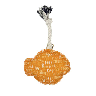 Rope dog toy with natural beige twisted rope, frayed black-and-white tassel, and an orange ball printed with words