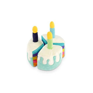 Dapper bone-appetit cake dog toy, pastel teal and white cake with rainbow layers and candles.