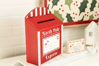 Wooden 9x12 chunky wood mailbox-style Christmas decor, red with white striped handle and North Pole Express label.
