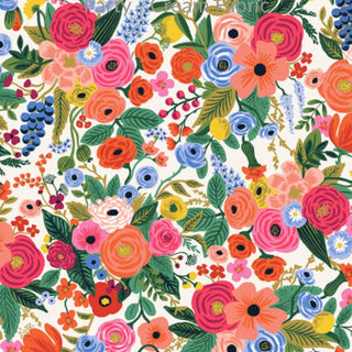 Garden Party Dog Collar with a vibrant floral print fabric in pink, orange, blue and green.