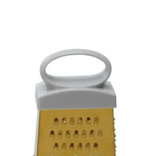 Stainless steel four-sided grater with a gold-tone finish and white loop handle.