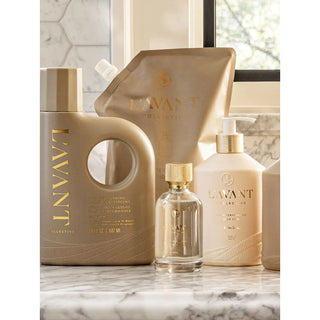 Ambre Santal room spray 100 ml by L'AVANT Collective; beige and gold packaging with refill pouch and pump bottle (4-piece display)