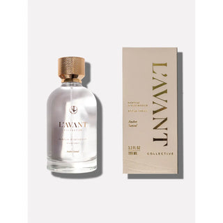 Ambre Santal room spray bottle (100 ml) with rose-gold cap beside beige box.
