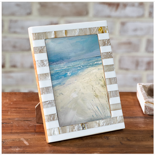 Beige stripe resin photo frame with white-and-beige striped border and beach scene inside.