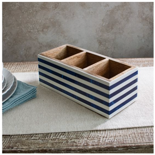 Blue stripe resin caddy with three compartments and natural wood interior