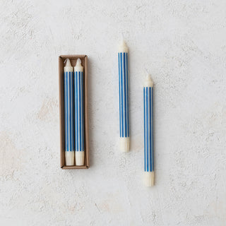 Blue striped unscented taper candles, 4-piece set with 2 in box and 2 outside.