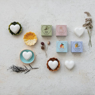 Bar soap set of four pastel boxed scents (olive oil, honeysuckle, citrus grove, lemon verbena) with white heart soaps.