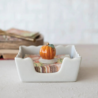Stoneware scalloped cocktail napkin holder with weight, white ceramic; holds 4-inch square napkins, pumpkin accent.