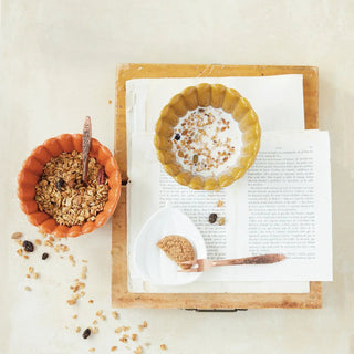 Stoneware pumpkin-shaped dish, white; decorative kitchenware for fall displays.