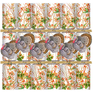 Christmas crackers set featuring turkey and berries motif on white background with gold ribbon by Caspari
