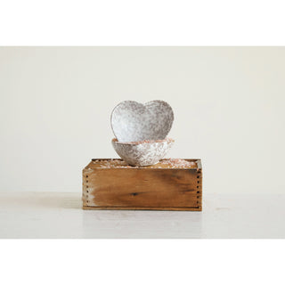 Stoneware heart dish and speckled bowl, two-piece set, white with gray speckle on rustic wooden box.