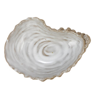 Shell-shaped white stoneware platter, 3-3/4 in long, with a swirled glaze.