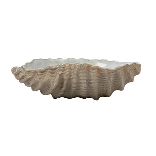 Shell-shaped stoneware dish with white interior and tan ridged exterior, 3-3/4 in