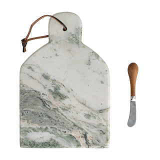 Marble cheese/cutting board with canape knife; white marble with green veining and a leather hanging strap.