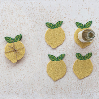Handmade beaded lemon coasters set of five with green leaf accents