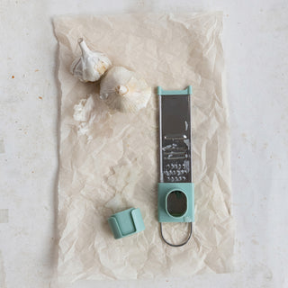 Stainless steel 3-way mini grater with adjustable mandolin slicer, teal accents