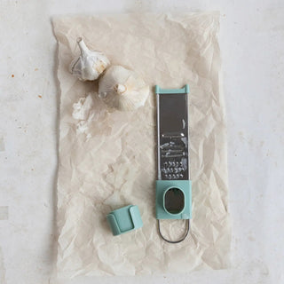 Stainless steel 3-way mini grater with adjustable mandolin slicer in teal