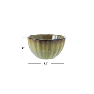 Stoneware ribbed bowl with reactive glaze in green-brown tones, 3.5 in diameter