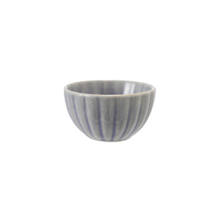 Stoneware ribbed bowl with reactive blue-gray glaze; color varies per piece.