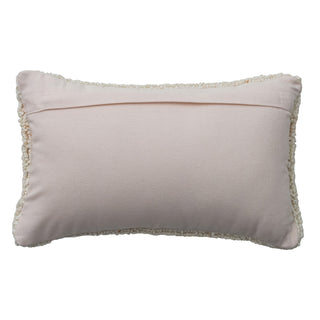 Cotton blend tufted lumbar pillow in pale pink with cream fringe trim