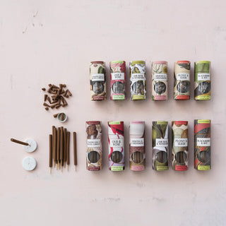 Incense cones with ceramic holders; 31-piece scented set in colorful, nature-inspired packaging