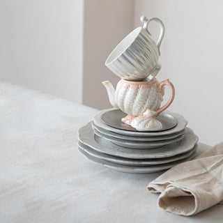 14 oz stoneware fluted mug in white with an iridescent faux-pearl finish