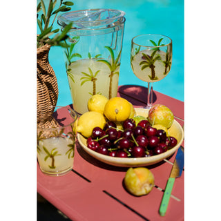 Acrylic pitcher with palm-tree print and lid, plus two matching palm-tree glasses