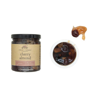 Cherry almond jam in a dark glass jar, 9 oz, with a brown kraft label.