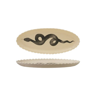 Set of 2 stoneware scalloped platters with black snake motif on ivory.